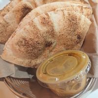 Pita and hot sauce at Aladdin's Eatery - Hyde Park in Cincinnati