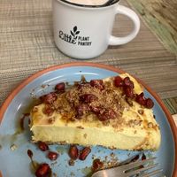 The mango cheesecake and a cappuccino   at Little Plant Pantry in Amsterdam
