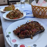 Stuffed eggplants, okra and stuffed peppers at the back at Temi Albanian Food in Berat