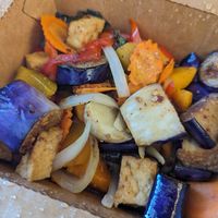 I enjoyed the Spicy Pumpkin - Eggplant - Tofu dish from LA Vegan with sauteed pumpkin, Chinese eggplant, tofu with mint leaves, chili, garlic, onions, and bell peppers. at LA Vegan in Los Angeles
