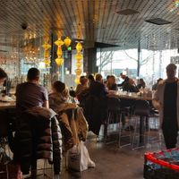 Dining hall at Globus Bellevue Food Hall in Zurich