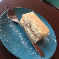 Coconut cake with strawberry jam vegan  at Cafuné in Preston