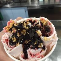 Strawberry vanilla with chocolate sauce, chocolate chips, and peanuts! at T-op Cold Grill Ice Cream in Franklin