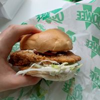 'Chicken' burger with garlic mayo, lettuce and red onions at Oowee Vegan - Baldwin in Bristol