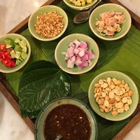 Miang Kam - a classic Northern Thai sharing appetiser where you place all these little ingredients on a Betel leaf, usually comes with shrimp at Ginger Farm Kitchen in Chiang Mai