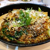 Warm noodles with turmeric, lemongrass sauce (no.32) with tofu topping at An Khang Quan in Dusseldorf