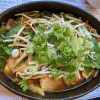 Delicious tofu with veggies in spicy sauce in a hot pan at An Khang Quan in Dusseldorf