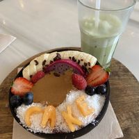 Açai Bowl and Matcha Latte with soy milk  at Brunch and Cake By The Sea in Barcelona