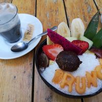 Black latte and Açai bowl at Brunch and Cake By The Sea in Barcelona
