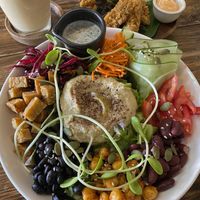Buddha bowl, chicken fingers and coconut latte   at Ganita Cafe in Pai