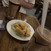 Spring rolls and snicker drink   at Ganita Cafe in Pai