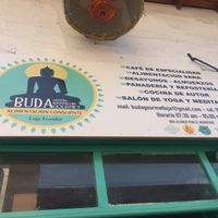 Sign outside at El Jardín de Buda in Loja