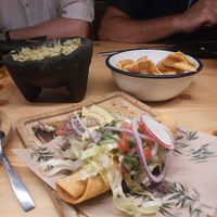 Flautas de boniato, nachos, guacamole at Gallo Santo in Barcelona