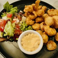 Vegan calamari! So good! 🤤  at Fishes & More in Palm Beach