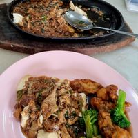 Sizzling tofu and fried mushrooms. at Chin Hua Vegetarian Food in Malacca