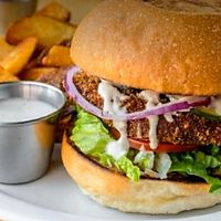 Crispy "Chick'n" Sandwich with an option of side of fries, soup or salad. at EarthBowl in Tijuana