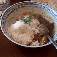 Half eaten Mushroom and Pea curry bowl at Tama in Auckland