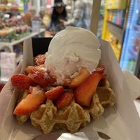 Waffle with strawberries and vanilla ice cream  at VeganWaf in Brussels