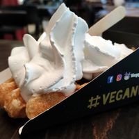 My waffle with banana and chantilly topping, NOTE HappyCOW Logo !!!! at VeganWaf in Brussels