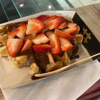 Waffel with chocolate topping (5,50€) and strawberries (2,50€) - 4.5/5. In total it cost 8€. at VeganWaf in Brussels