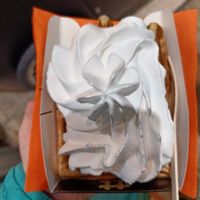 Waffle with chocolate sauce and whipped cream at VeganWaf in Brussels