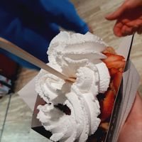 Waffle with strawberries, chocolate and whipped cream at VeganWaf in Brussels