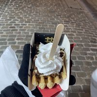 Waffle with chocolate, banana, and whipped cream  at VeganWaf in Brussels