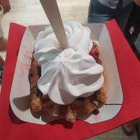 Waffle with chocolate sauce, strawberries and whipped cream at VeganWaf in Brussels