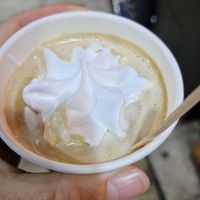 Cappuccino with whipped cream at VeganWaf in Brussels