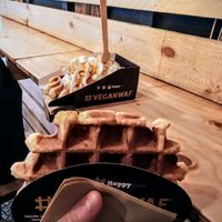 Plain waffle, and waffle with cream and caramel sauce at VeganWaf in Brussels