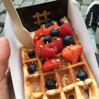 Toppings: mixed berries and nuts. at VeganWaf in Brussels