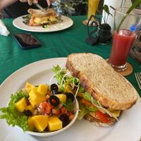 Hummus sourdough sandwich with mango salsa on the side + watermelon juice at The Garden in Koh Lanta