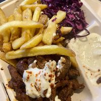 Vyros Teller w/ fries & kraut to go 🍟 at Zum glücklichen Bergschweinchen in Kassel