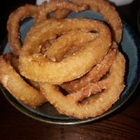 Portion of 12 onion rings at The Crystal Palace  in Glasgow