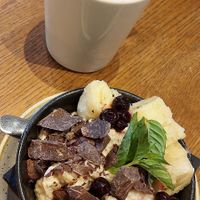 Porridge and soy cappuccino at Spreegold in Berlin