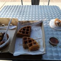 Very tasty chicken nuggets dusted with powdered sugar. So good I ate half before taking photo. at Vegans Are Us in Vineland