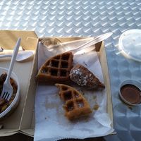 Chicken and waffles with side of home fries. at Vegans Are Us in Vineland