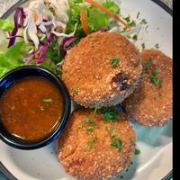 Arancini balls - wild mushrooms and curry pumpkin risotto croquettes at Mika in Airlie Beach