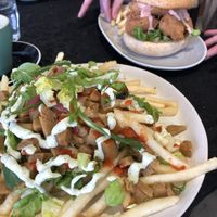 Loaded fries and gluten free tofu burger. Amazing!  at GG Bistro in Christchurch