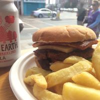 Cheese burger with bacon, fries and organic cola  at Pretend in Dublin