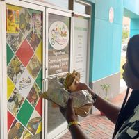 Me enjoying the Lentil burger. at Speedy Redemption in St Thomas