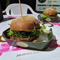Shiitake hambúrguer in the front and urtiga hambúrguer at the back. at Senhor Shiitake in Joinville