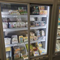 Fridge with cheezes at V.gan in Brussels