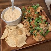 Breaded airfried mushroom with a cheesy dip sauce. Try the buffalo wild wings with blue cheez as well. Delicious! at My Conscious Plate in Lake Worth