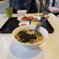 Udon Soup and the fried chicken in the background at Maru JaYeonSik Kimbap in Seoul