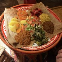Injera flatbread with veggies and legumes 🌱  at Addis Abeba in Barcelona