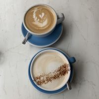 Chai latte (special), and coffee latte  at The Flower Cup in Chester