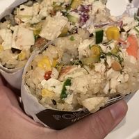 The burrito with sushi rice, tofu, corn cucumber, ginger, green seaweed, cucumber,  mango, cabbage and teriyaki   at Pokemoto in Norwalk