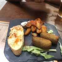 Hummus tosta and spinach croquetas   at La Buena Vida in Granada