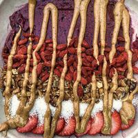 Artfully crafted smoothie bowl with tons of topping choices  at Thrive in Hampstead